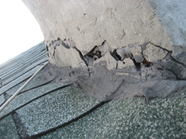 Tar Cracked at Chimney Flashing found by Barrie Home Inspections