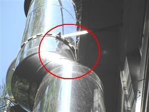 Chimney is too Close to Fascia found by Barrie WETT Certified Inspections