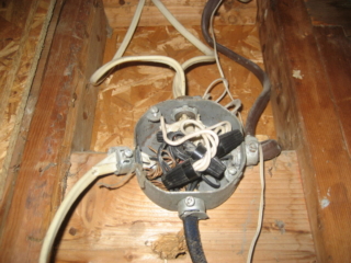 Cover is required for electrical box.  Too many wires installed in box.