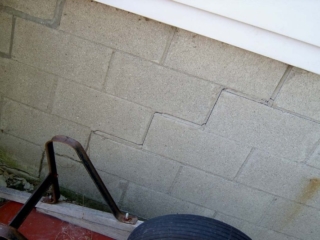 Step Crack in Masonry Foundation Wall
